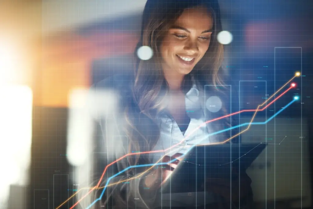 Frau analysiert Finanzdaten am Computer – Financipation Club